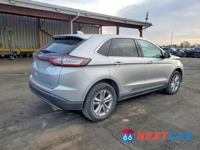 Trzecie zdjęcie samochodu z tyłu: 2015 FORD EDGE SEL VIN:2FMTK4J84FBC11692 - miniatura