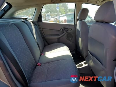 Zdjęcie 11 z 14 samochodu: 2004 FORD FOCUS ZX5 VIN:3FAFP37Z74R110972 - miniatura