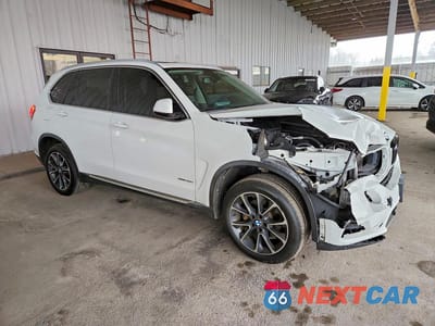 Czwarte zdjęcie samochodu z boku: 2014 BMW X5 XDRIVE35I VIN:5UXKR0C51E0K47863 - miniatura