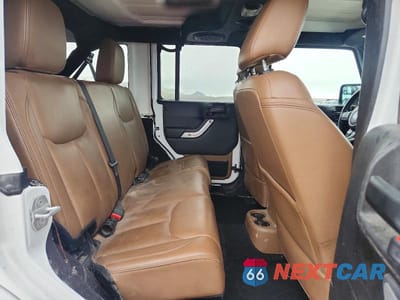 Zdjęcie 10 z 11 samochodu: 2013 JEEP WRANGLER UNLIMITED SAHARA VIN:1C4BJWEG8DL550291 - miniatura