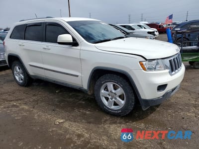 Czwarte zdjęcie samochodu z boku: 2011 JEEP GRAND CHEROKEE LAREDO VIN:1J4RR4GG1BC580782 - miniatura
