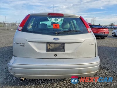 Zdjęcie 6 z 12 samochodu: 2005 FORD FOCUS ZX5 VIN:3FAFP37NX5R150378 - miniatura