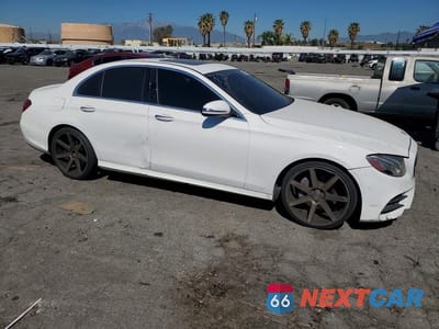 Czwarte zdjęcie samochodu z boku: 2017 MERCEDES-BENZ E 300 VIN:WDDZF4JBXHA098351 - miniatura