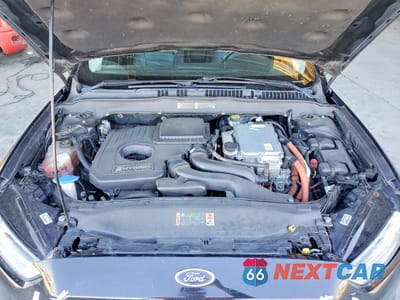 Zdjęcie 11 z 12 samochodu: 2015 FORD FUSION SE HYBRID VIN:3FA6P0LU9FR128448 - miniatura