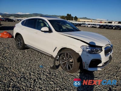 Czwarte zdjęcie samochodu z boku: 2021 BMW X4 XDRIVE30I VIN:5UX2V1C09M9G15077 - miniatura