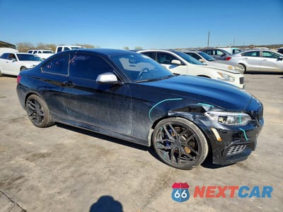 Czwarte zdjęcie samochodu z boku: 2016 BMW M235I VIN:WBA1J7C59GV360427 - miniatura