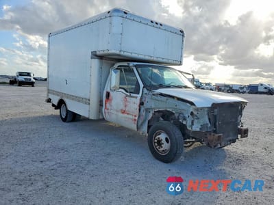 Czwarte zdjęcie samochodu z boku: 1999 FORD F350 SUPER DUTY DELIVERY TRUCK VIN:1FDWF36S1XEE60909 - miniatura