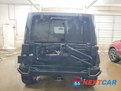 Zdjęcie 6 z 11 samochodu: 2013 JEEP WRANGLER UNLIMITED SAHARA VIN:1C4BJWEG8DL509580 - miniatura