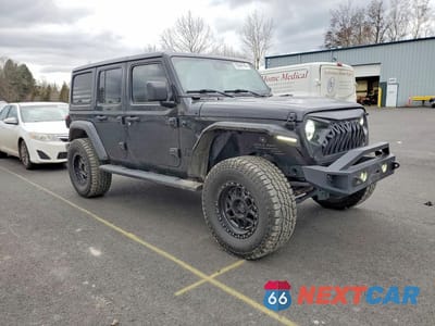 Czwarte zdjęcie samochodu z boku: 2020 JEEP WRANGLER UNLIMITED SPORT VIN:1C4HJXDN1LW184803 - miniatura