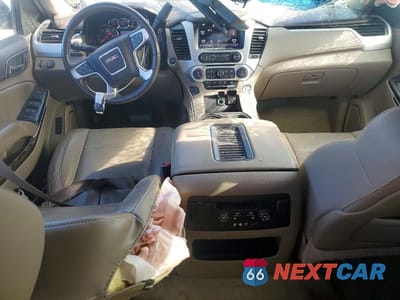 Zdjęcie 8 z 12 samochodu: 2015 GMC YUKON XL C1500 SLT VIN:1GKS1HKC6FR662041 - miniatura