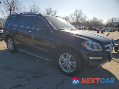Czwarte zdjęcie samochodu z boku: 2014 MERCEDES-BENZ GL 450 4MATIC VIN:4JGDF7CE6EA278642 - miniatura