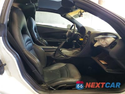 Zdjęcie 10 z 13 samochodu: 1999 CHEVROLET CORVETTE VIN:1G1YY22G2X5117330 - miniatura