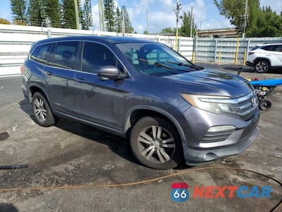 Czwarte zdjęcie samochodu z boku: 2018 HONDA PILOT EX VIN:5FNYF5H30JB006588 - miniatura