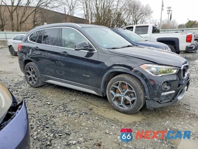 Czwarte zdjęcie samochodu z boku: 2017 BMW X1 VIN:WBXHT3C3XH5F71842 - miniatura