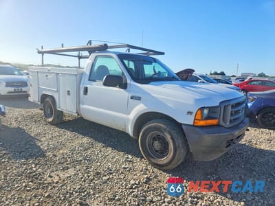 Czwarte zdjęcie samochodu z boku: 2001 FORD F250 SUPER DUTY UTILITY / SERVICE TRUCK VIN:1FTNF20L91EB72977 - miniatura