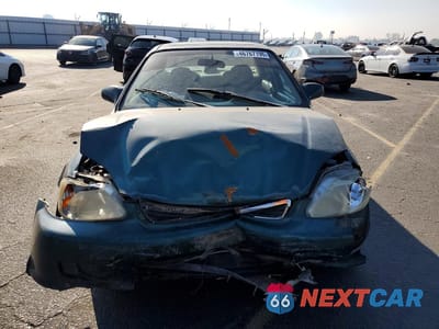 Piąte zdjęcie samochodu w środku: 1999 HONDA CIVIC EX VIN:2HGEJ8542XH535299 - miniatura