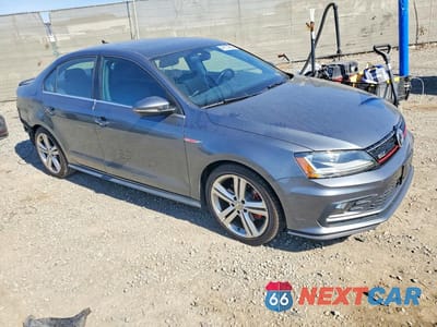 Czwarte zdjęcie samochodu z boku: 2017 VOLKSWAGEN JETTA VIN:3VW4T7AJ9HM336938 - miniatura