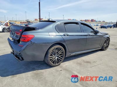 Trzecie zdjęcie samochodu z tyłu: 2019 BMW 750 I VIN:WBA7F0C5XKGM25835 - miniatura