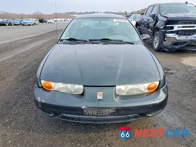 Piąte zdjęcie samochodu w środku: 2000 SATURN SL1 VIN:1G8ZH5289YZ250113 - miniatura
