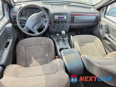 Zdjęcie 8 z 12 samochodu: 2000 JEEP GRAND CHEROKEE LAREDO VIN:1J4GW48S2YC394602 - miniatura