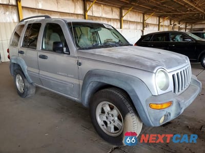 Czwarte zdjęcie samochodu z boku: 2003 JEEP LIBERTY SPORT VIN:1J4GK48KX3W564563 - miniatura