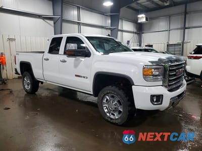 Czwarte zdjęcie samochodu z boku: 2015 GMC SIERRA K2500 SLT VIN:1GT22ZEG4FZ514970 - miniatura