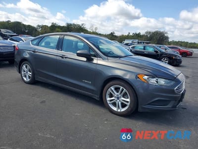 Czwarte zdjęcie samochodu z boku: 2018 FORD FUSION SE HYBRID VIN:3FA6P0LU4JR268948 - miniatura