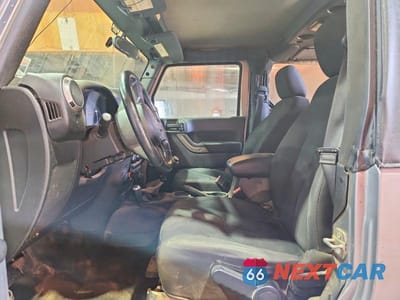 Zdjęcie 7 z 13 samochodu: 2016 JEEP WRANGLER SPORT VIN:1C4AJWAG1GL181831 - miniatura