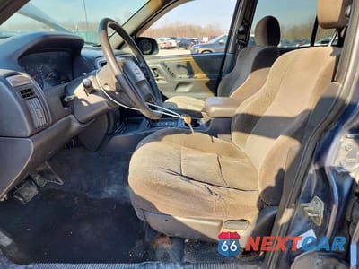 Zdjęcie 7 z 12 samochodu: 2001 JEEP GRAND CHEROKEE LAREDO VIN:1J4GW48S31C518480 - miniatura