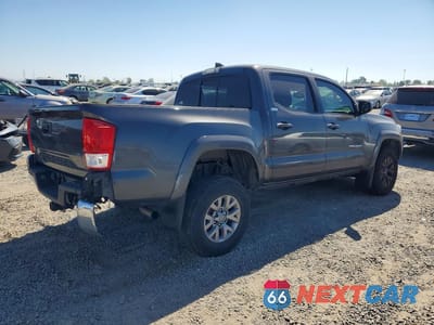 Trzecie zdjęcie samochodu z tyłu: 2017 TOYOTA TACOMA SR5 V6 VIN:3TMAZ5CN6HM042292 - miniatura