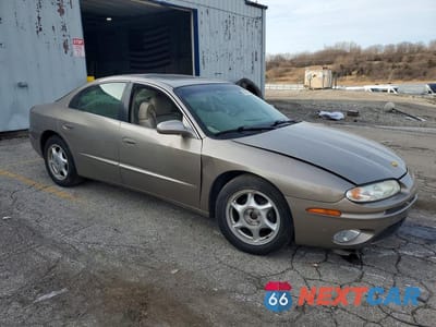 Czwarte zdjęcie samochodu z boku: 2001 OLDSMOBILE AURORA 4.0 VIN:1G3GS64C514109421 - miniatura