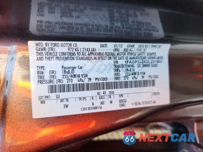 Zdjęcie 12 z 12 samochodu: 2013 FORD FOCUS TITANIUM VIN:1FADP3J2XDL231903 - miniatura