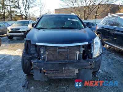 Piąte zdjęcie samochodu w środku: 2015 CADILLAC SRX LUXURY COLLECTION VIN:3GYFNEE37FS572724 - miniatura