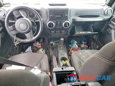 Zdjęcie 8 z 11 samochodu: 2017 JEEP WRANGLER UNLIMITED SAHARA VIN:1C4BJWEG3HL747651 - miniatura