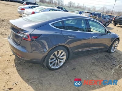 Trzecie zdjęcie samochodu z tyłu: 2018 TESLA MODEL 3 VIN:5YJ3E1EB3JF054815 - miniatura