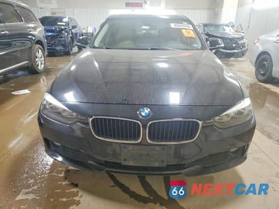 Piąte zdjęcie samochodu w środku: 2014 BMW 320 I VIN:WBA3B1G51ENS80758 - miniatura