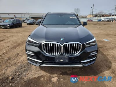 Piąte zdjęcie samochodu w środku: 2021 BMW X5 XDRIVE40I VIN:5UXCR6C04M9F76372 - miniatura