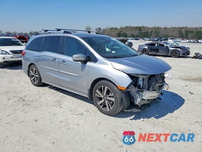 Czwarte zdjęcie samochodu z boku: 2023 HONDA ODYSSEY TOURING VIN:5FNRL6H86PB017490 - miniatura