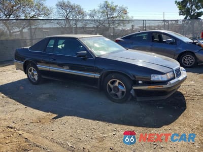 Czwarte zdjęcie samochodu z boku: 1994 CADILLAC ELDORADO VIN:1G6EL12Y4RU621059 - miniatura