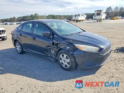 Czwarte zdjęcie samochodu z boku: 2017 FORD FOCUS S VIN:1FADP3E26HL338804 - miniatura