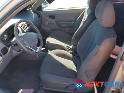 Zdjęcie 7 z 13 samochodu: 2003 HYUNDAI ACCENT BASE VIN:KMHCF35C13U260030 - miniatura