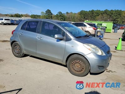 Czwarte zdjęcie samochodu z boku: 2011 TOYOTA YARIS BASE VIN:JTDKT4K3XB5342625 - miniatura