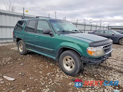 Czwarte zdjęcie samochodu z boku: 1999 FORD EXPLORER VIN:1FMDU34E8XUB73423 - miniatura