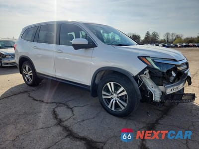 Czwarte zdjęcie samochodu z boku: 2018 HONDA PILOT EXLN VIN:5FNYF6H77JB069082 - miniatura
