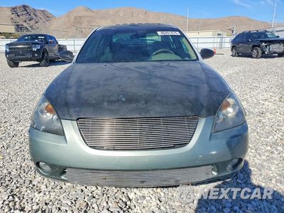 Piąte zdjęcie samochodu w środku: 2002 NISSAN ALTIMA 3.5 SE VIN:1N4BL11D12C107198 - miniatura