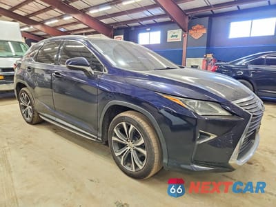 Czwarte zdjęcie samochodu z boku: 2017 LEXUS RX 350 BASE VIN:2T2BZMCA6HC067886 - miniatura