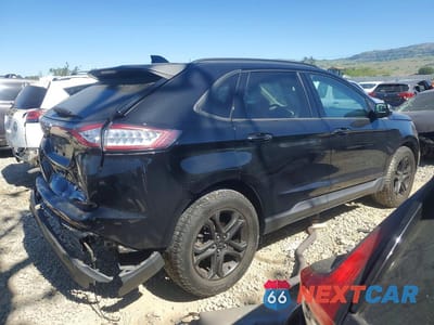 Trzecie zdjęcie samochodu z tyłu: 2018 FORD EDGE SEL VIN:2FMPK4J95JBB29232 - miniatura