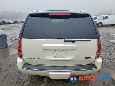 Zdjęcie 6 z 12 samochodu: 2012 GMC YUKON XL DENALI VIN:1GKS2MEF1CR247104 - miniatura