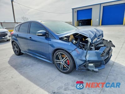 Czwarte zdjęcie samochodu z boku: 2018 FORD FOCUS VIN:1FADP3L90JL289752 - miniatura
