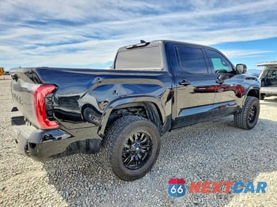 Trzecie zdjęcie samochodu z tyłu: 2024 TOYOTA TUNDRA PLATINUM HV VIN:5TFNC5DB6RX049682 - miniatura